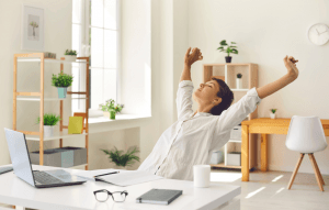 customer stretching at desk