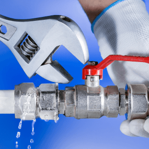 Wrench Fixing Pipe Leak