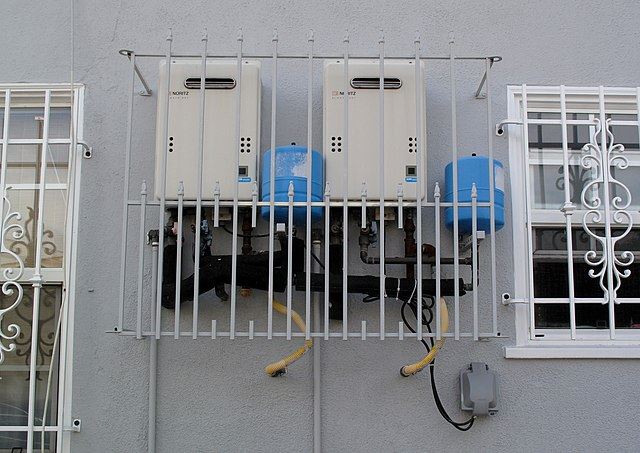 two outdoor tankless water heaters