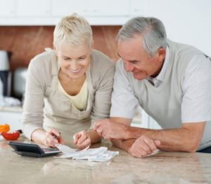 couple looking at calculator
