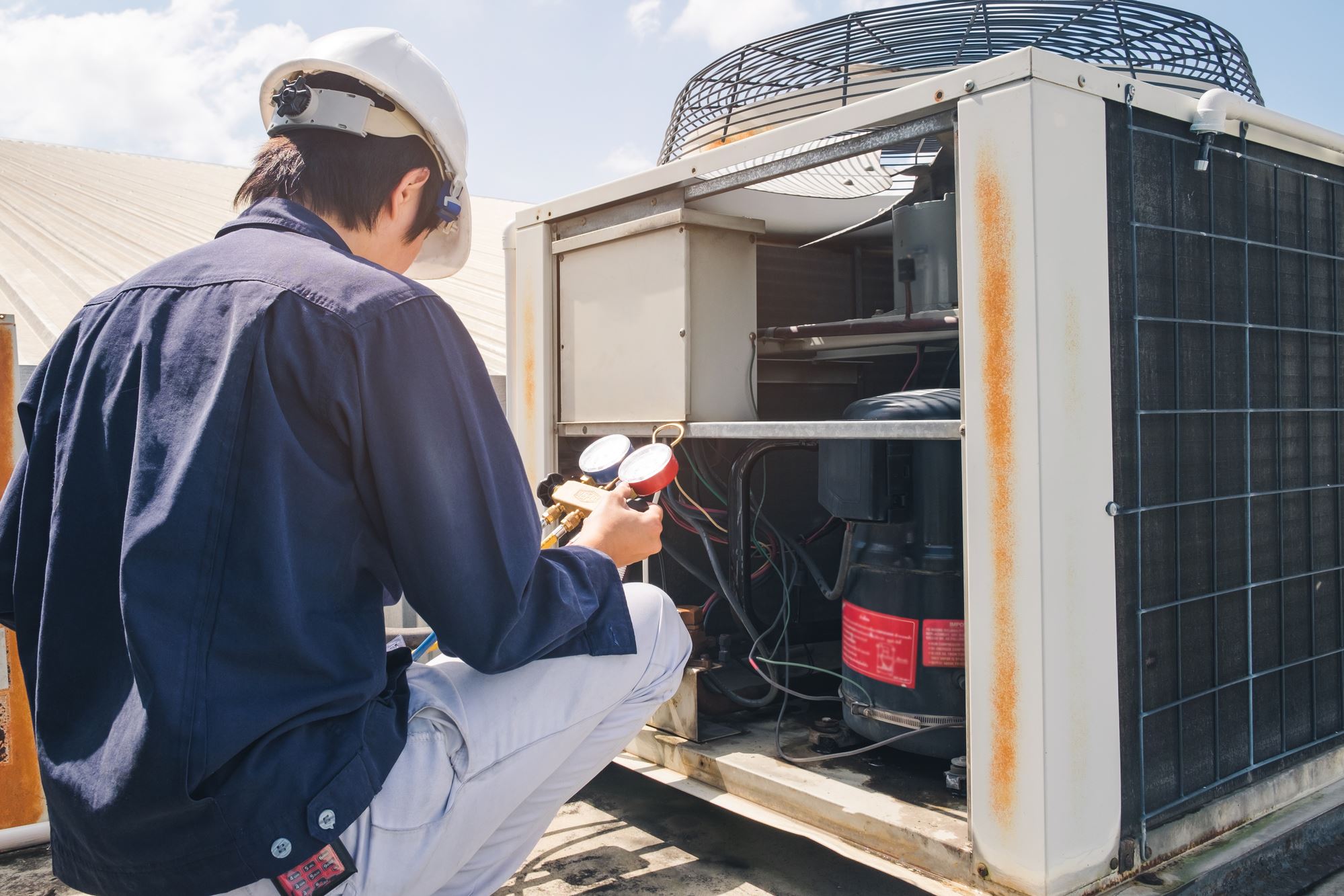technician checking HVAC